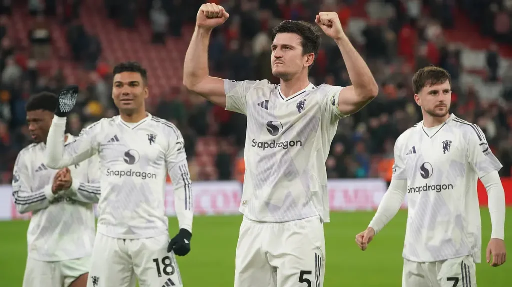 Harry Maguire celebrating his goal against Liverpool