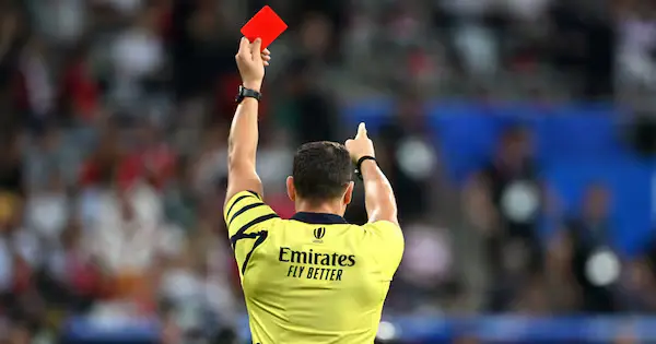 referee gives player red card